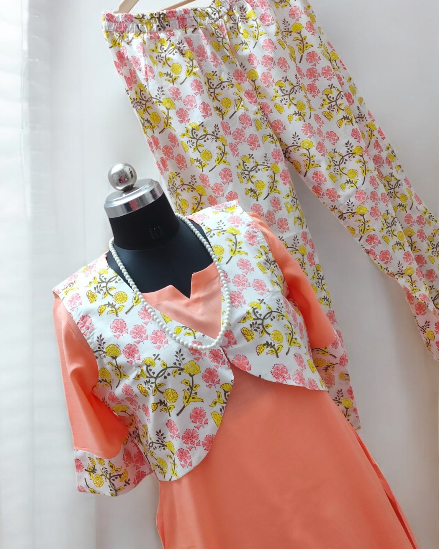 Peach Palazzo suits with Overcoat